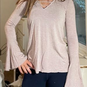 Purple and white American eagle shirt size: xs